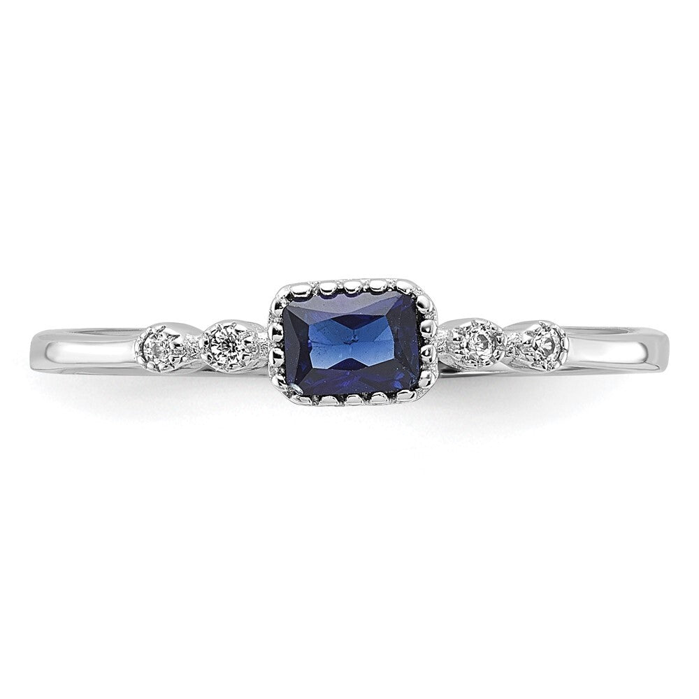 SS Rhodium-plated .02Cr. Blue Spinel and .02Cr. White Sapphire Ring Size 7