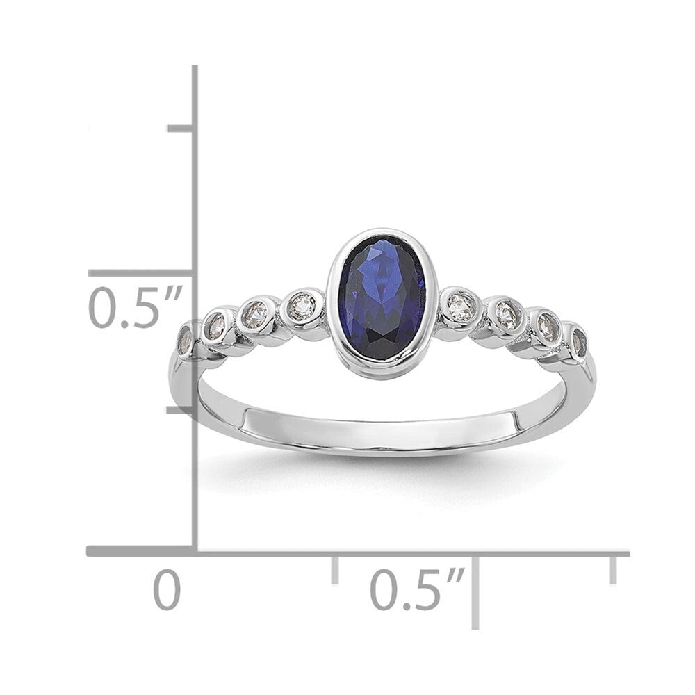 SS Rh-plated .01Created White Sapphire .56Created Blue Spinel Ring Size 8