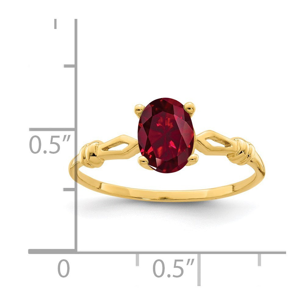14K Yellow Gold 7x5mm Oval Created Ruby ring