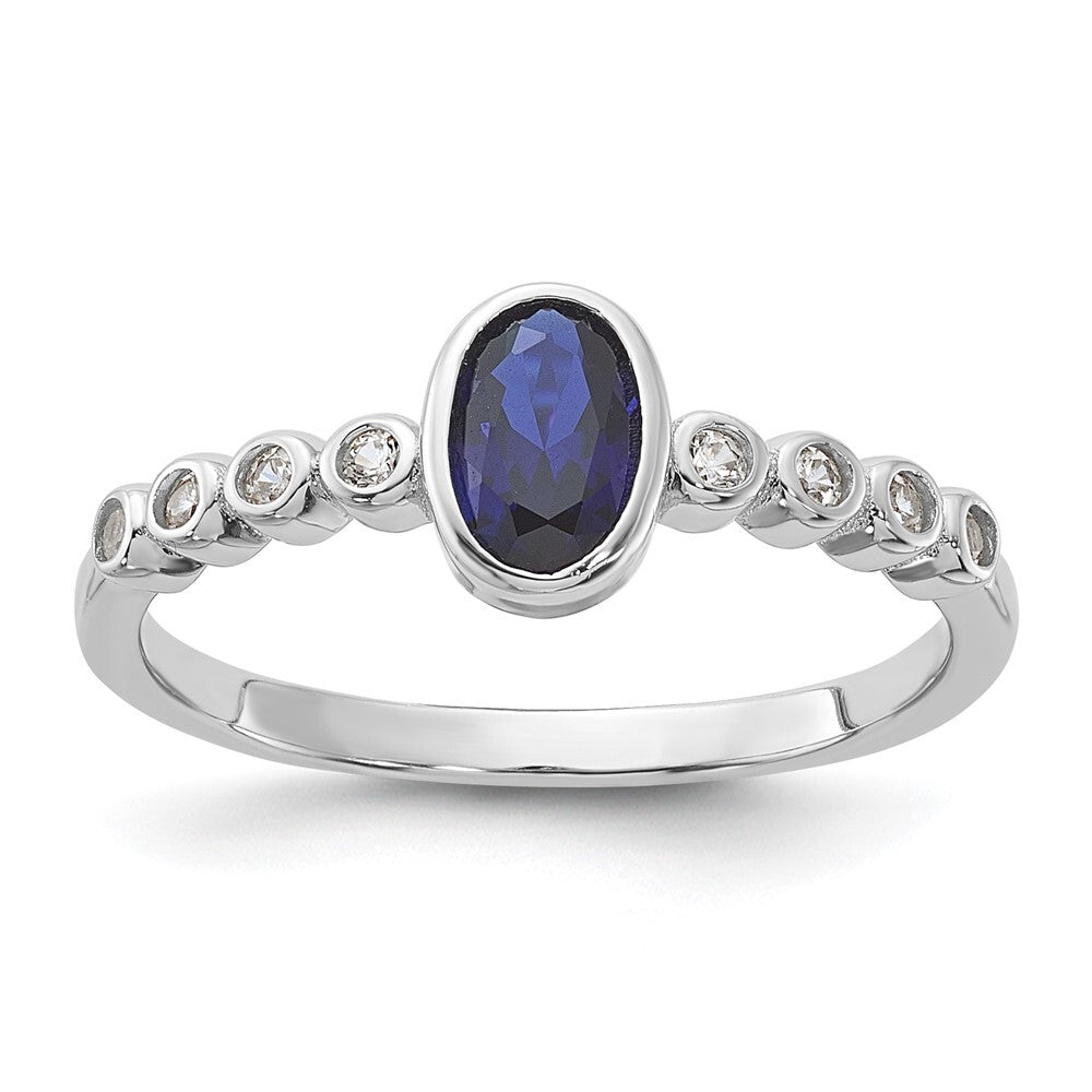 SS Rh-plated .01Created White Sapphire .56Created Blue Spinel Ring Size 7