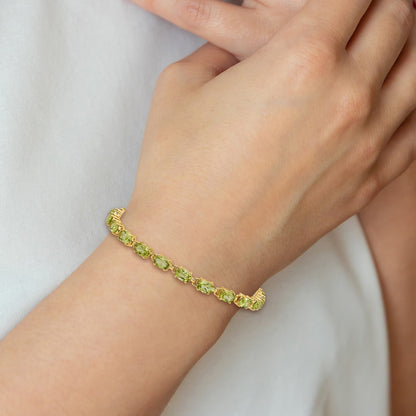 14k Complete 6x4mm Oval Peridot 7 inch Bracelet