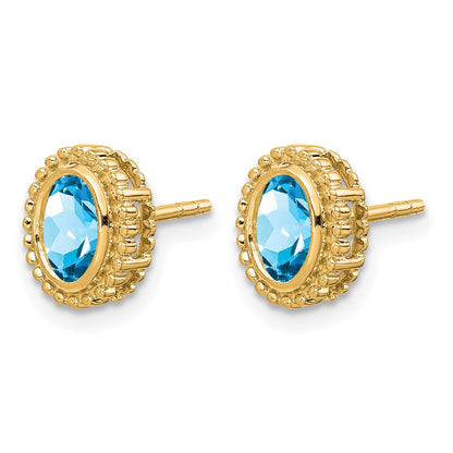 14k 6x4mm Oval Blue Topaz Post Earrings