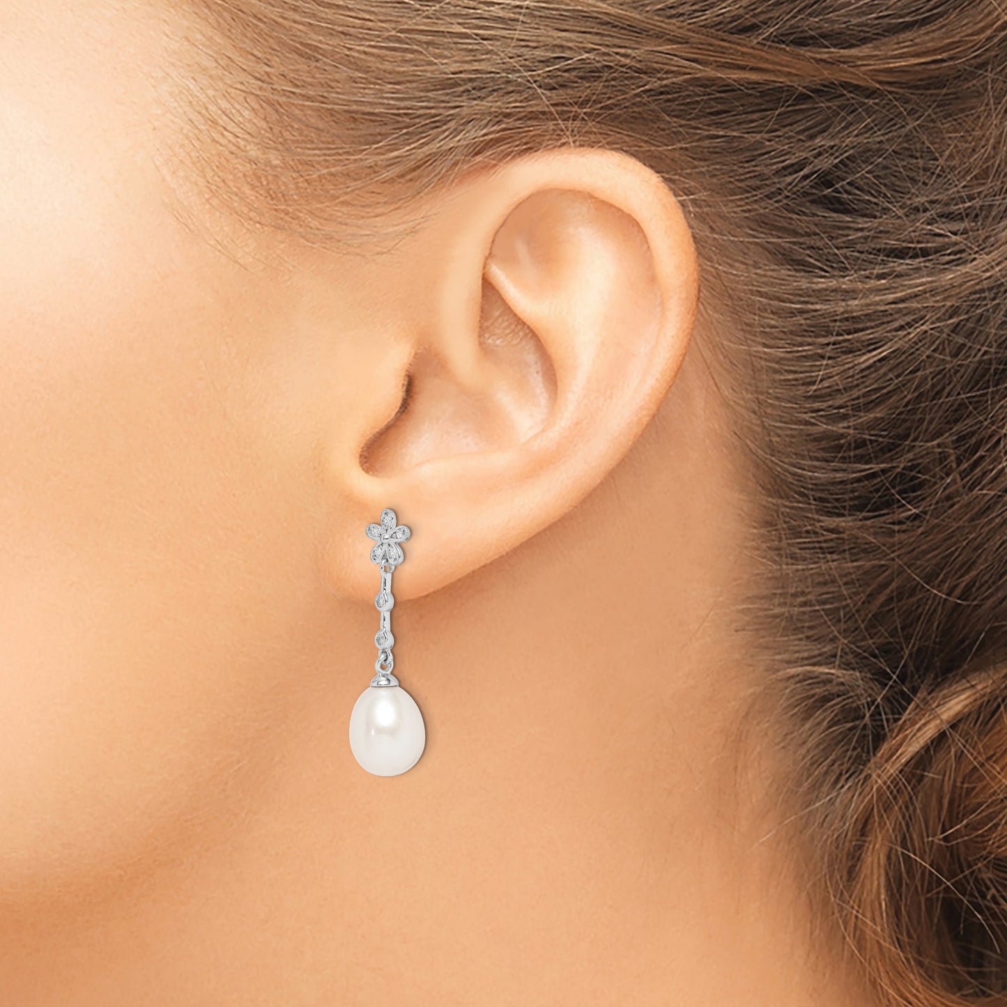 Sterling Silver Rhodium-plated 8-9mm White Rice Freshwater Cultured Pearl and CZ Flower Post Dangle Earrings