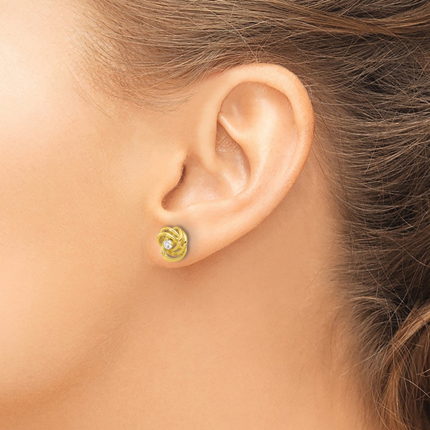 Affordable Expressions Sterling Silver Gold-tone Love Knot CZ Stud Earrings