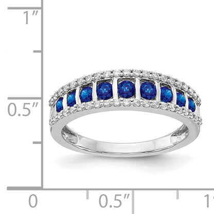 14k White Gold Graduated Channel-set Blue Sapphire and 1/4 carat Diamond Fancy Ring