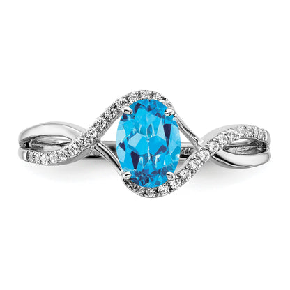 14k White Gold 7x5mm Oval Blue Topaz and 1/10 carat Diamond Twist Ring