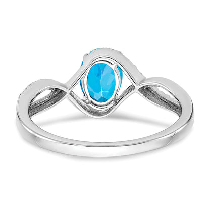 14k White Gold 7x5mm Oval Blue Topaz and 1/10 carat Diamond Twist Ring