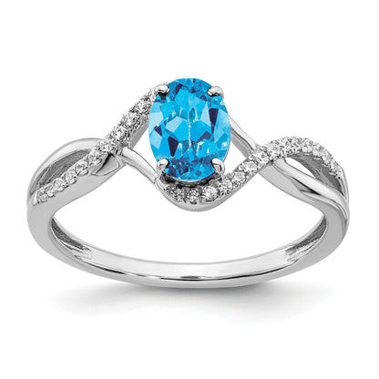 14k White Gold 7x5mm Oval Blue Topaz and 1/10 carat Diamond Twist Ring