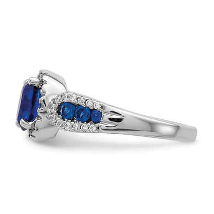 14k White Gold 7x5mm Oval Blue Sapphire and 1/3 carat Diamond Halo Ring