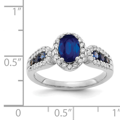 14k White Gold 7x5mm Oval Blue Sapphire and 1/3 carat Diamond Halo Ring