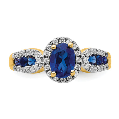 14k 7x5mm Oval Blue Sapphire and 1/3 carat Diamond Halo Ring