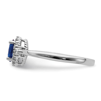 14k White Gold 6x4mm Oval Blue Sapphire and 1/10 carat Diamond Halo Ring