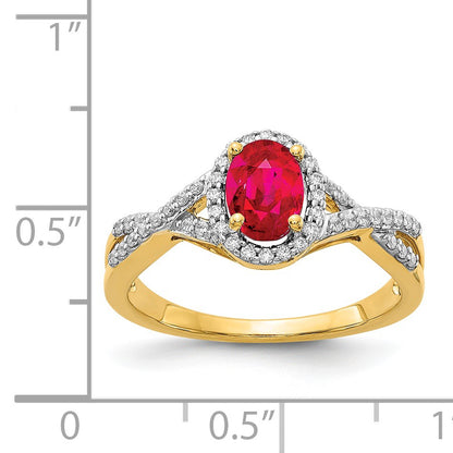 14k 7x5mm Oval Ruby and 1/5 carat Diamond Halo Ring