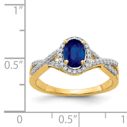14k 7x5mm Oval Blue Sapphire and 1/5 carat Diamond Halo Ring