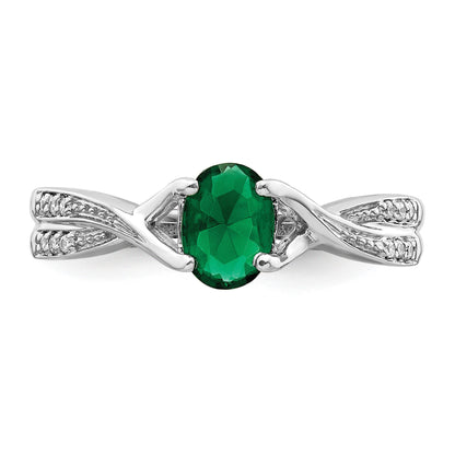 14k White Gold 7x5mm Oval Emerald and 1/15 carat Diamond Ring