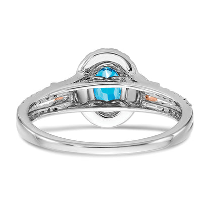 14k White and Rose Gold 7x5mm Oval Blue Topaz and 1/4 carat Diamond Halo Ring