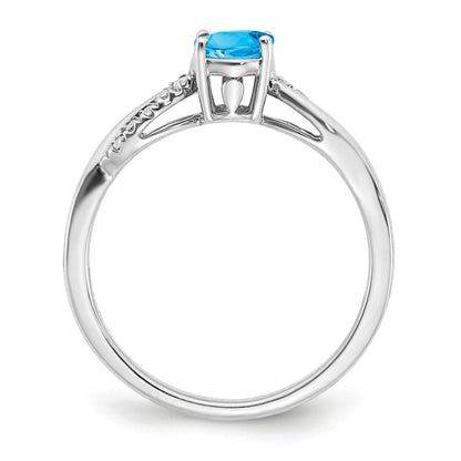 14k White Gold 7x5mm Oval Blue Topaz and 1/20 carat Diamond Ring