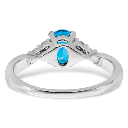 14k White Gold 7x5 Oval Blue Topaz and 1/8 carat Diamond Ring