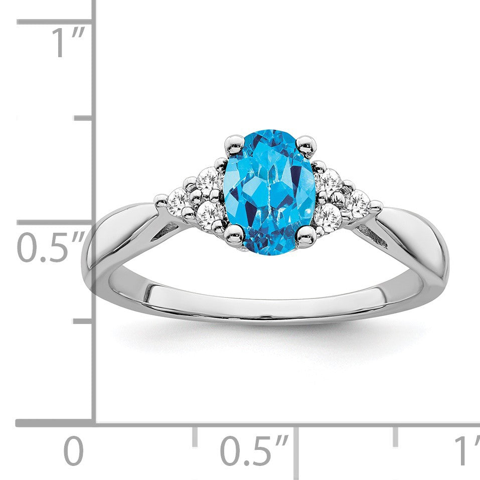 14k White Gold 7x5 Oval Blue Topaz and 1/8 carat Diamond Ring
