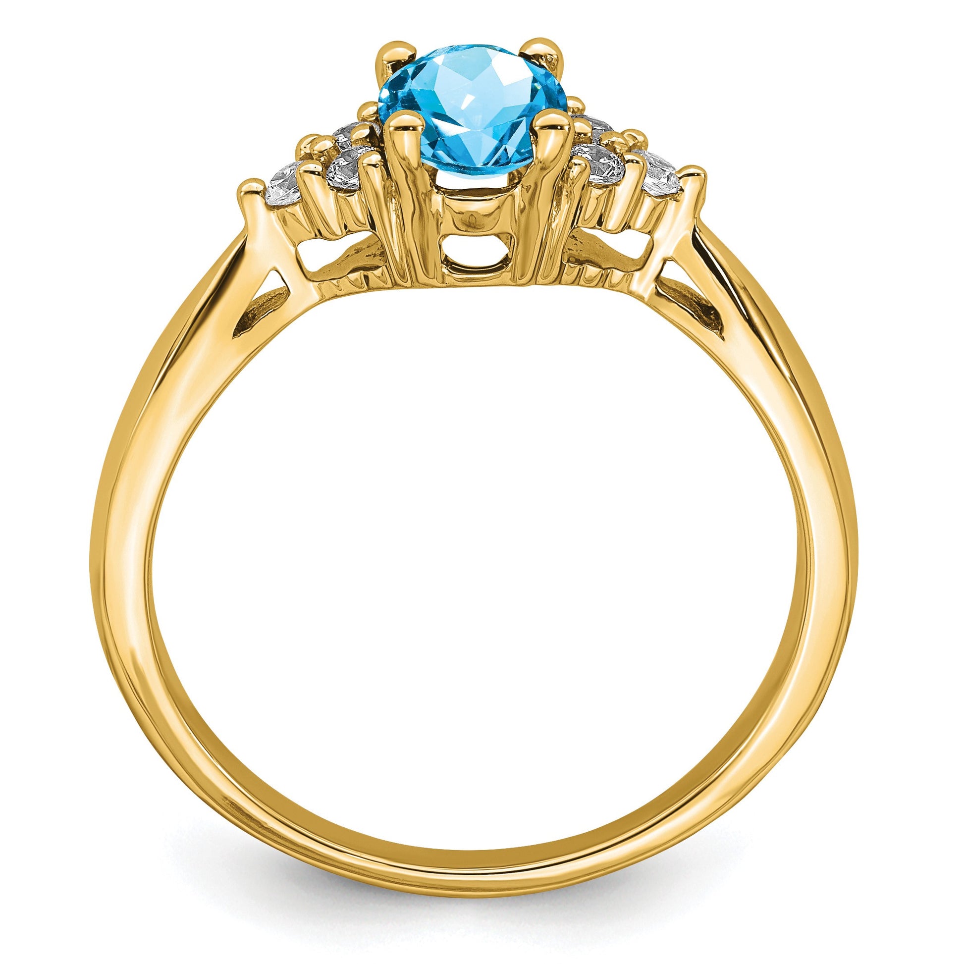 14k 7x5 Oval Blue Topaz and 1/8 carat Diamond Ring