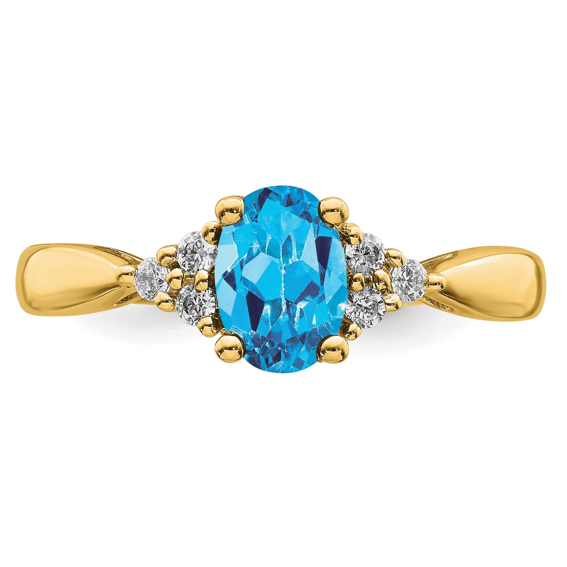 14k 7x5 Oval Blue Topaz and 1/8 carat Diamond Ring
