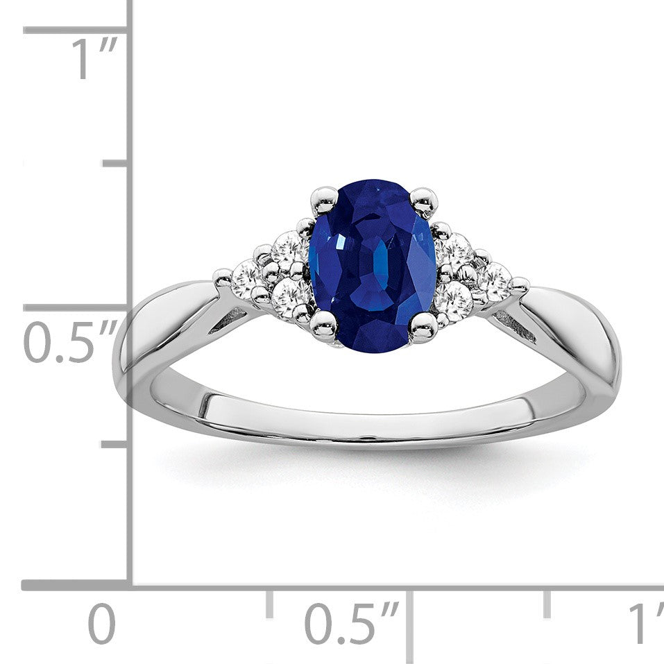 14k White Gold 5x7mm Oval Lab Created Blue Sapphire and 1/8 carat Diamond Ring