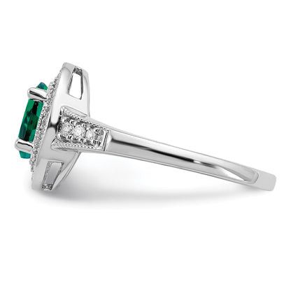 14k White Gold 7x5mm Oval Lab-Created Emerald and 1/6 carat Diamond Halo Ring