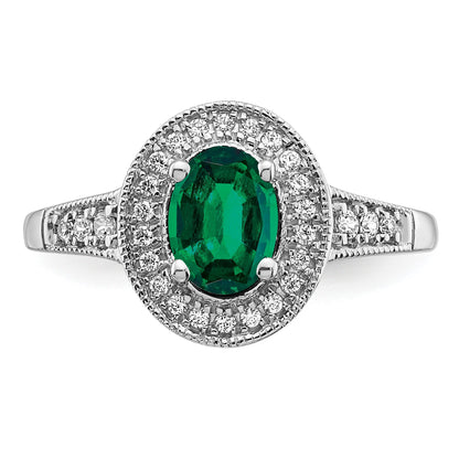 14k White Gold 7x5mm Oval Lab-Created Emerald and 1/6 carat Diamond Halo Ring