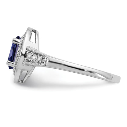 14k White Gold 7x5mm Oval Lab-Created Blue Sapphire and 1/6 carat Diamond Halo Ring