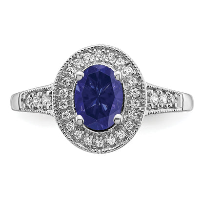 14k White Gold 7x5mm Oval Lab-Created Blue Sapphire and 1/6 carat Diamond Halo Ring