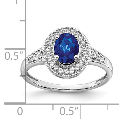 14k White Gold 7x5mm Oval Lab-Created Blue Sapphire and 1/6 carat Diamond Halo Ring