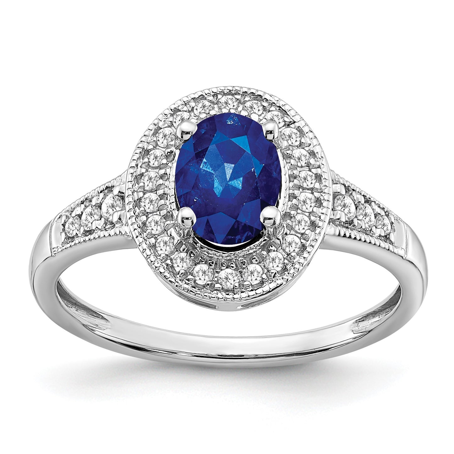 14k White Gold 7x5mm Oval Lab-Created Blue Sapphire and 1/6 carat Diamond Halo Ring