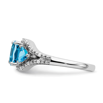 14k White Gold 7mm Cushion Blue Topaz and 1/15 carat Diamond 3-Stone Ring