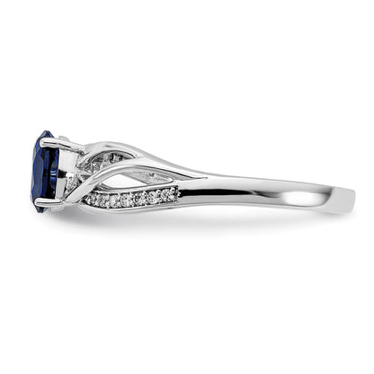 14k White Gold Polished 6x5mm Oval Blue Sapphire and 1/20 carat Diamond Ring