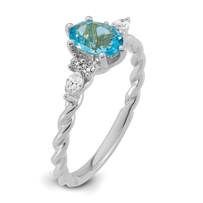 14K White Gold Diamond and 7x5 Oval December/Blue Topaz Size 7 Twisted Ring