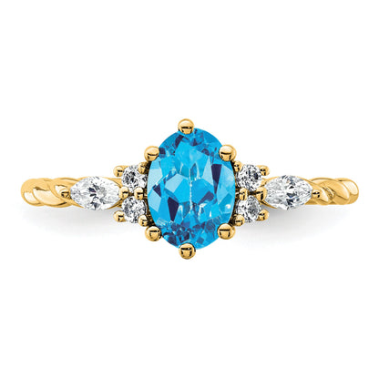 14K Diamond and 7x5 Oval December/Blue Topaz Size 7 Twisted Ring