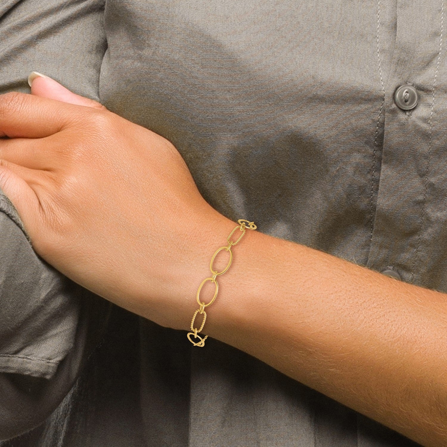 14k Polished And Twisted 9.5mm Oval Links 6.75 inch Bracelet Plus 0.5 inch Extender