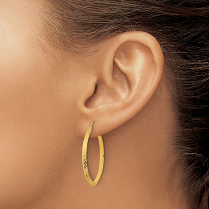 14K 2.00x33mm Polished Diamond-Cut Knife-Edge Tube Hoop Earrings
