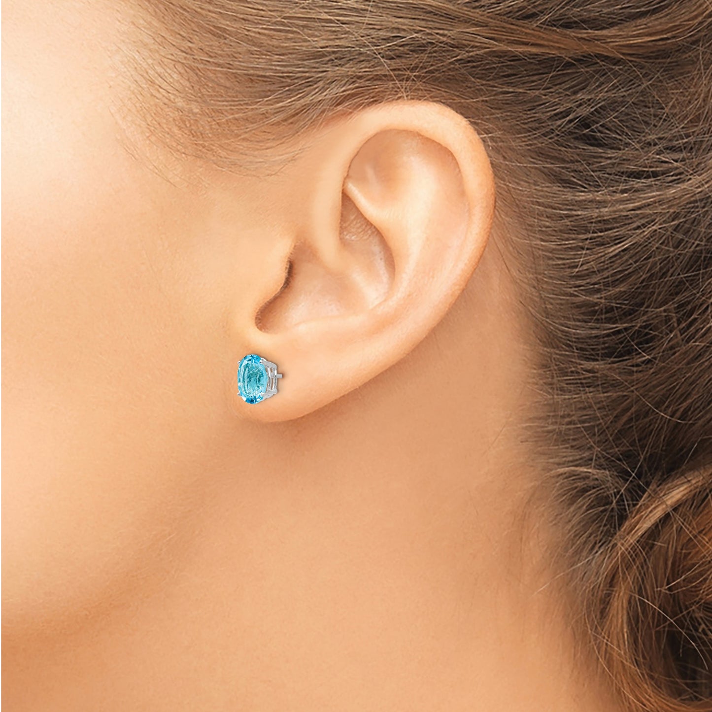 14k White Gold 8x6mm Oval Blue Topaz Post Earrings