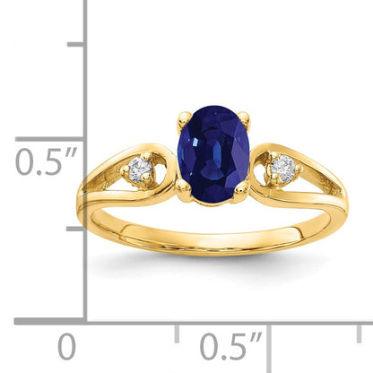 14k 7x5mm Oval Blue Sapphire and1/20 carat AA Diamond Ring