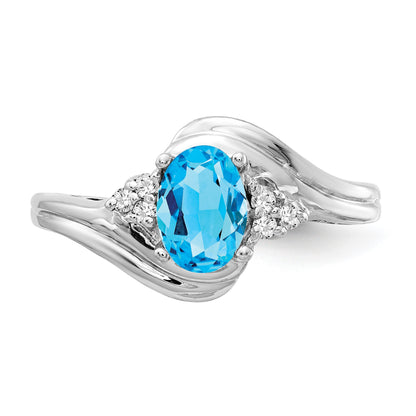 14k White Gold 7x5mm Oval Blue Topaz and 1/15 carat AA Diamond Ring