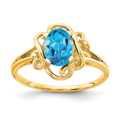 14k 7x5mm Oval Blue Topaz Ring