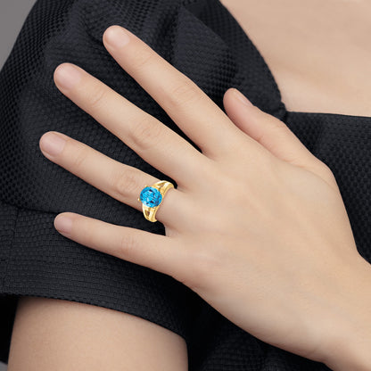 14k 11x9mm Oval Blue Topaz Ring