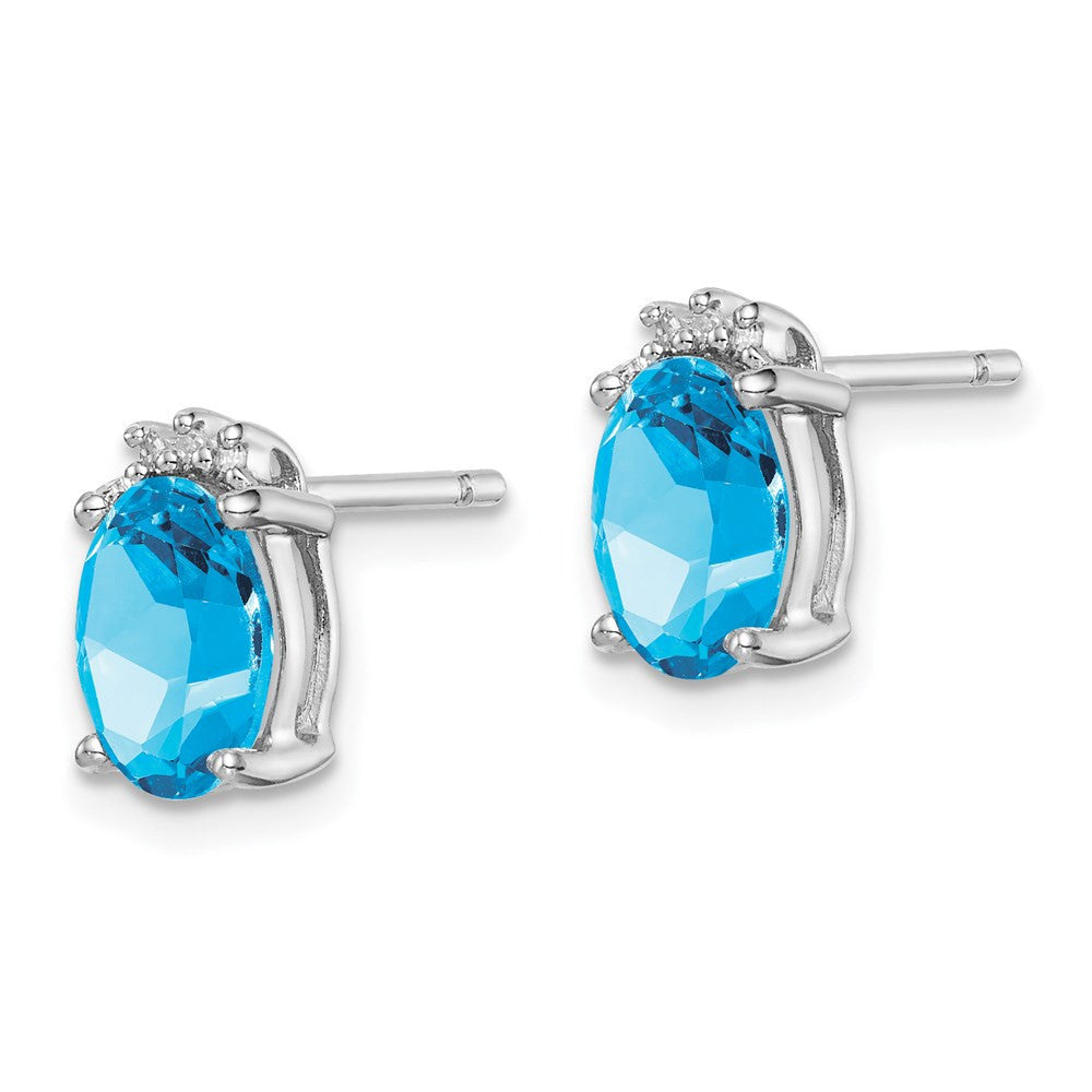 Sterling Silver Rhodium Plated Oval Blue Topaz and Diamond Button Stud Earrings