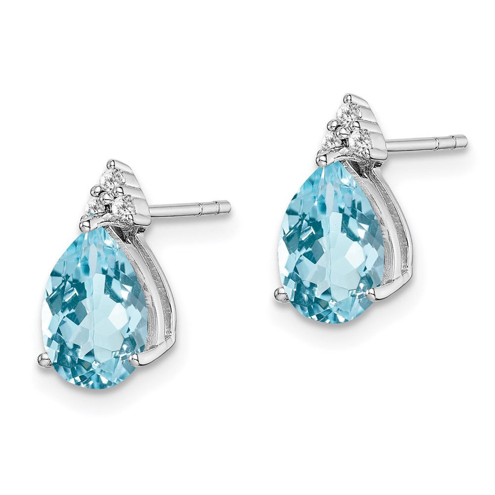 Sterling Silver Rhodium Plated Diamond and Blue Topaz Button Stud Earrings