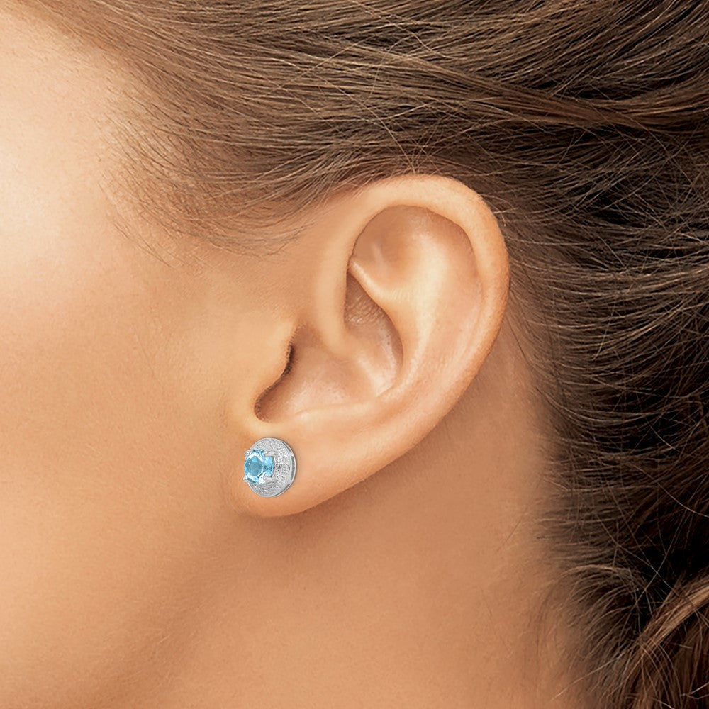Sterling Silver Rhodium Plated Diamond and Blue Topaz Button Stud Earrings