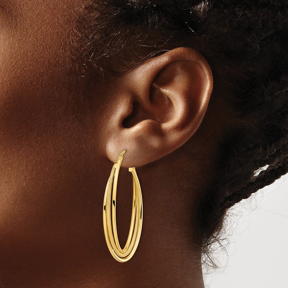 14k Yellow Gold Polished and Textured Twisted Fancy Oval Hoop Earrings