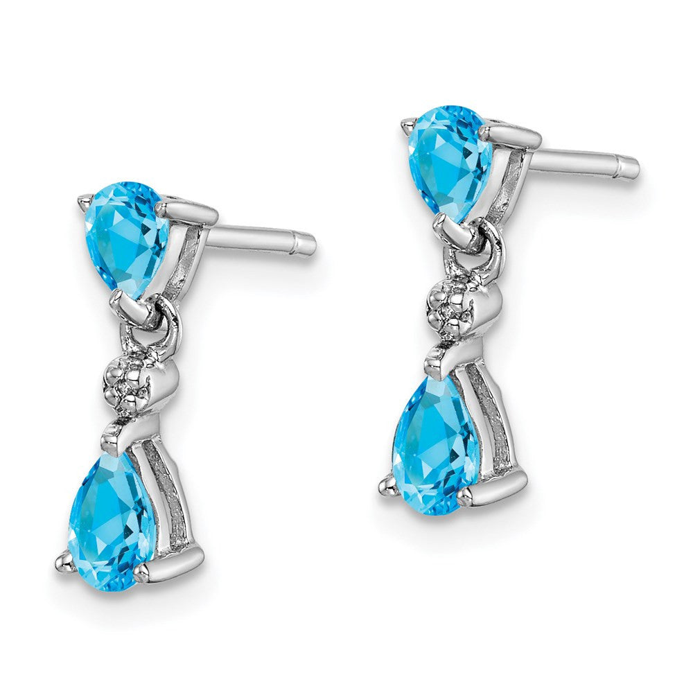 Sterling Silver Rhodium-plated Blue Topaz and Diamond Dangle Earrings