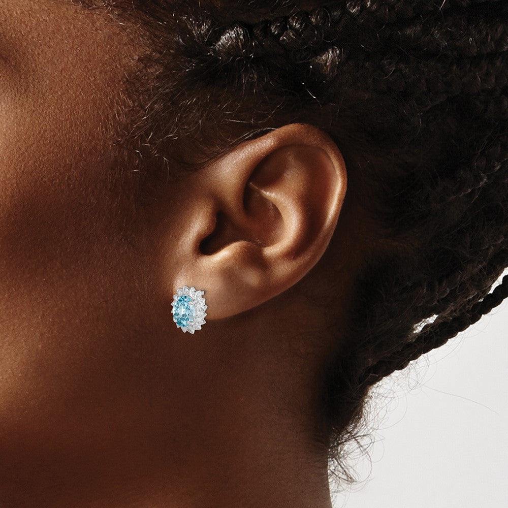 Sterling Silver Rhodium Plated Blue Topaz and Diamond Button Stud Earrings